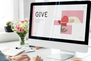 woman donating at computer